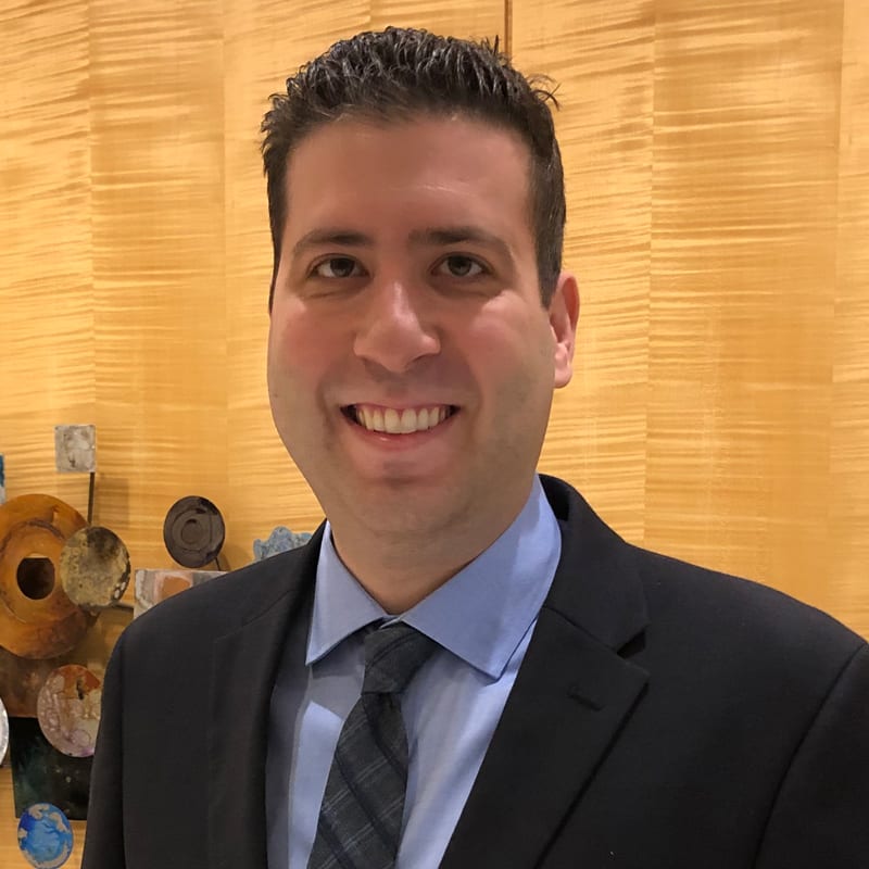 Greg E. Mann