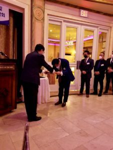 Photo of Gene receiving his award